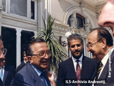 Agosto 1990. Rimini, meeting dell'Amicizia fra popoli. Andreotti con Genscher e Formigoni.